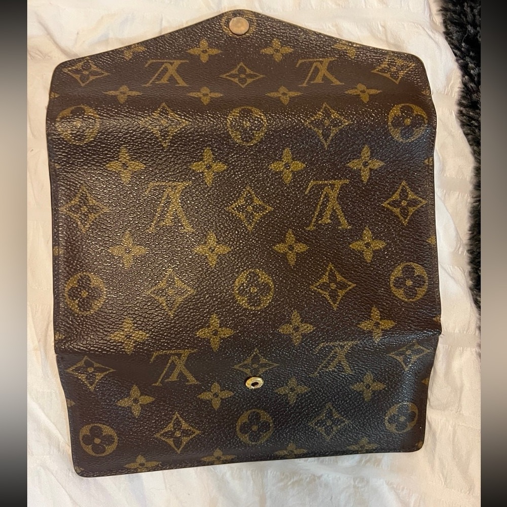 Louis Vuitton wallet.